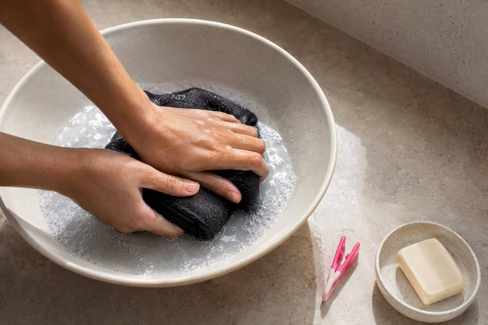 Hands washing folded absorbent textile