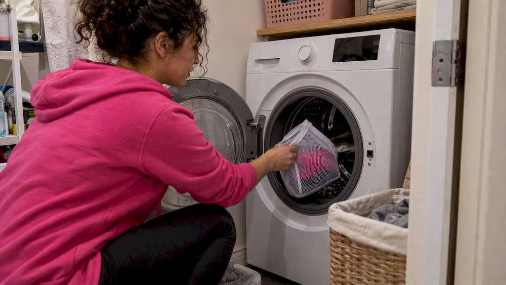 Mesh bag of period underwear in washer